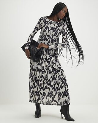 Cream Animal Print Long Sleeve Maxi Dress