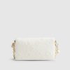 Cream Embossed Monogram Cross Body Bag