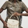 Cream Monogram Pocket Front Charmed Tote Bag