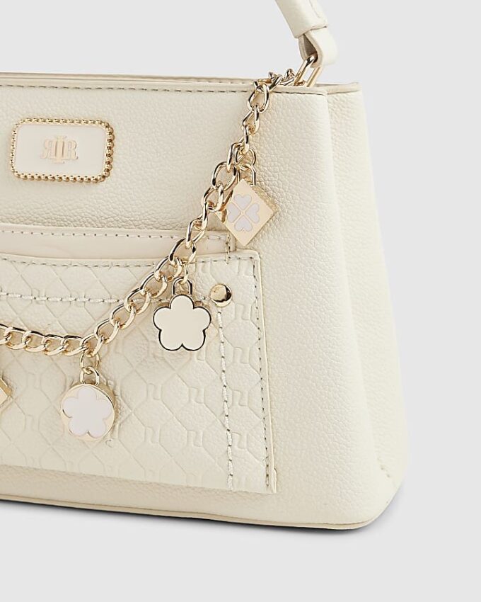 Cream Monogram Pocket Front Charmed Tote Bag